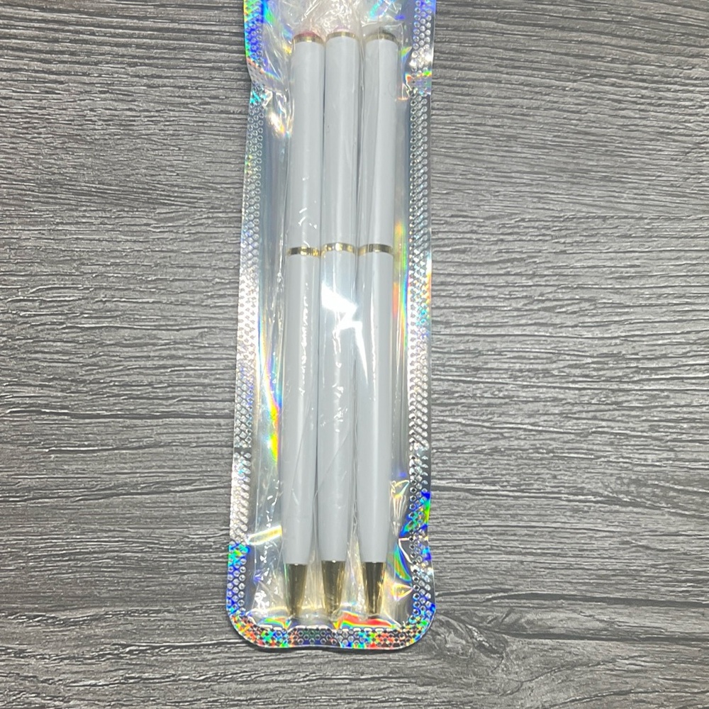 Elegant White and Gold Pen Set
